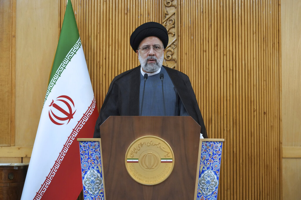 The Iranian president, Ebrahim Raisi, vowed revenge over the killing of a senior Revolutionary Guard member. AP/Vahid Salemi