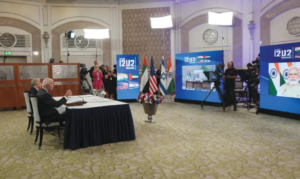 US PRESIDENT Joe Biden and Prime Minister Yair Lapid attend the first virtual meeting of the I2U2 group with leaders of India and the United Arab Emirates, in Jerusalem, in July. (photo credit: EVELYN HOCKSTEIN/REUTERS)