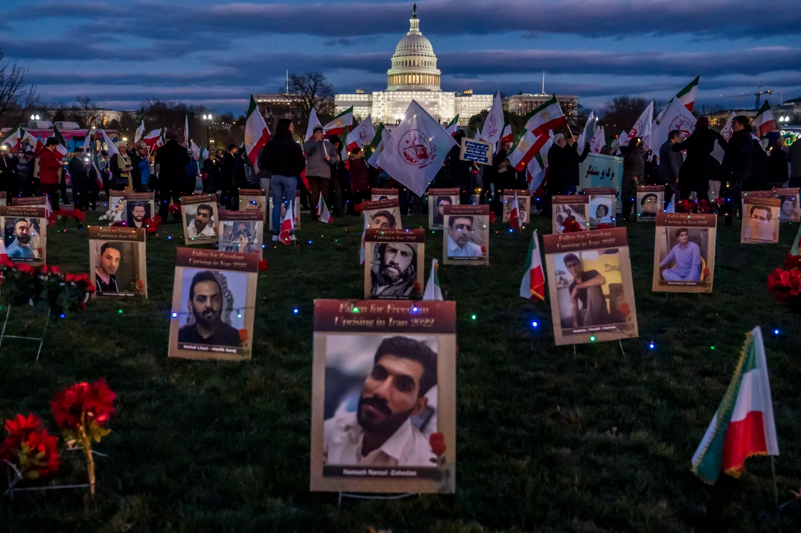 Photo: Protesters walk through a vigil honoring Iranians allegedly killed by their government during a rally in support of the ongoing protests in Iran at the National Mall in Washington D.C. on Saturday. Source: NPR, Nathan Howard/AP.