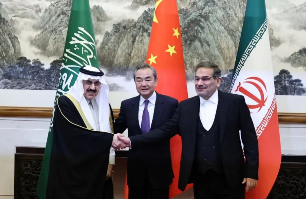 A photograph released by Chinese state media showing officials Wang Yi, center, China’s top foreign policy official, with Ali Shamkhani, right, the secretary of Iran’s security council, and Musaad bin Mohammed Al Aiban, Saudi Arabia’s minister of state, in Beijing, on Friday. Source: New York Times caption, photo from China Daily via Reuters.